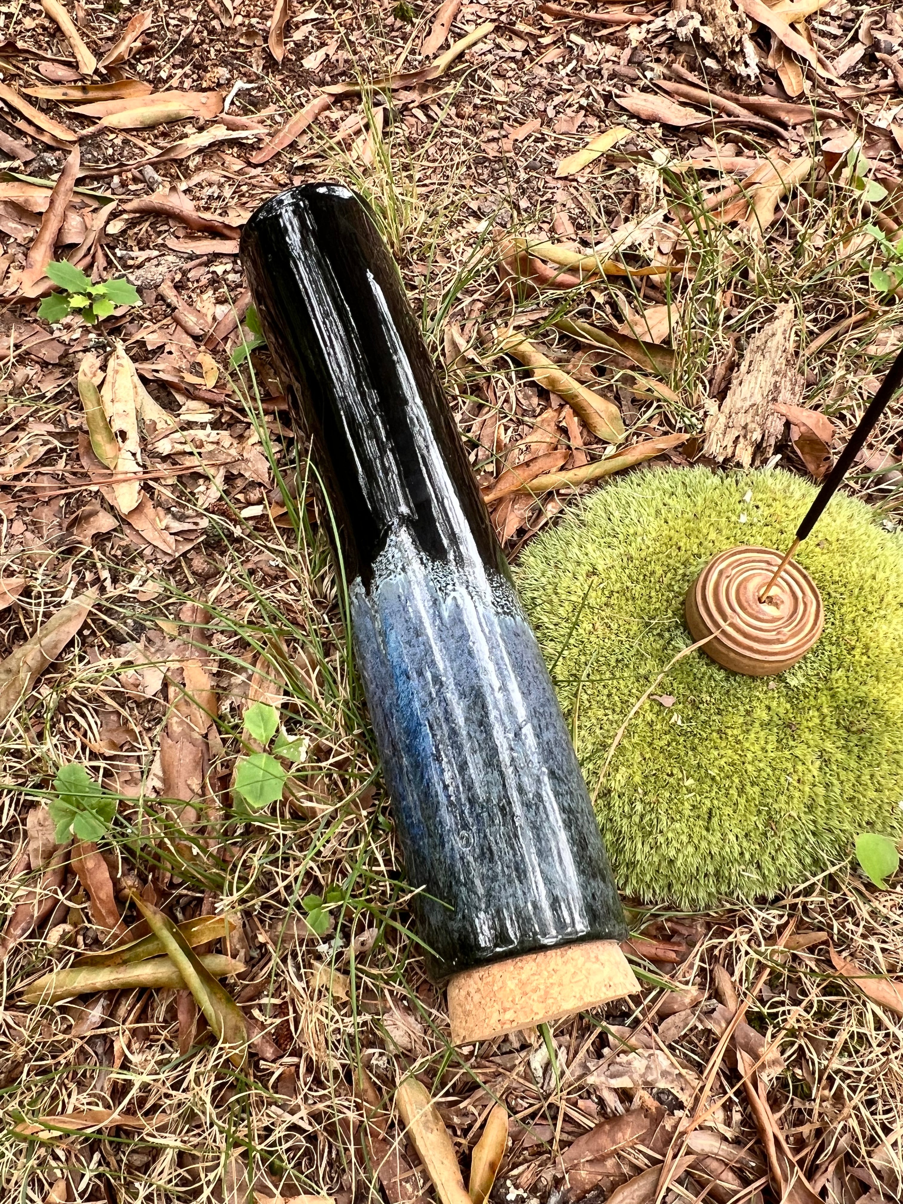 black and blue stick incense holder