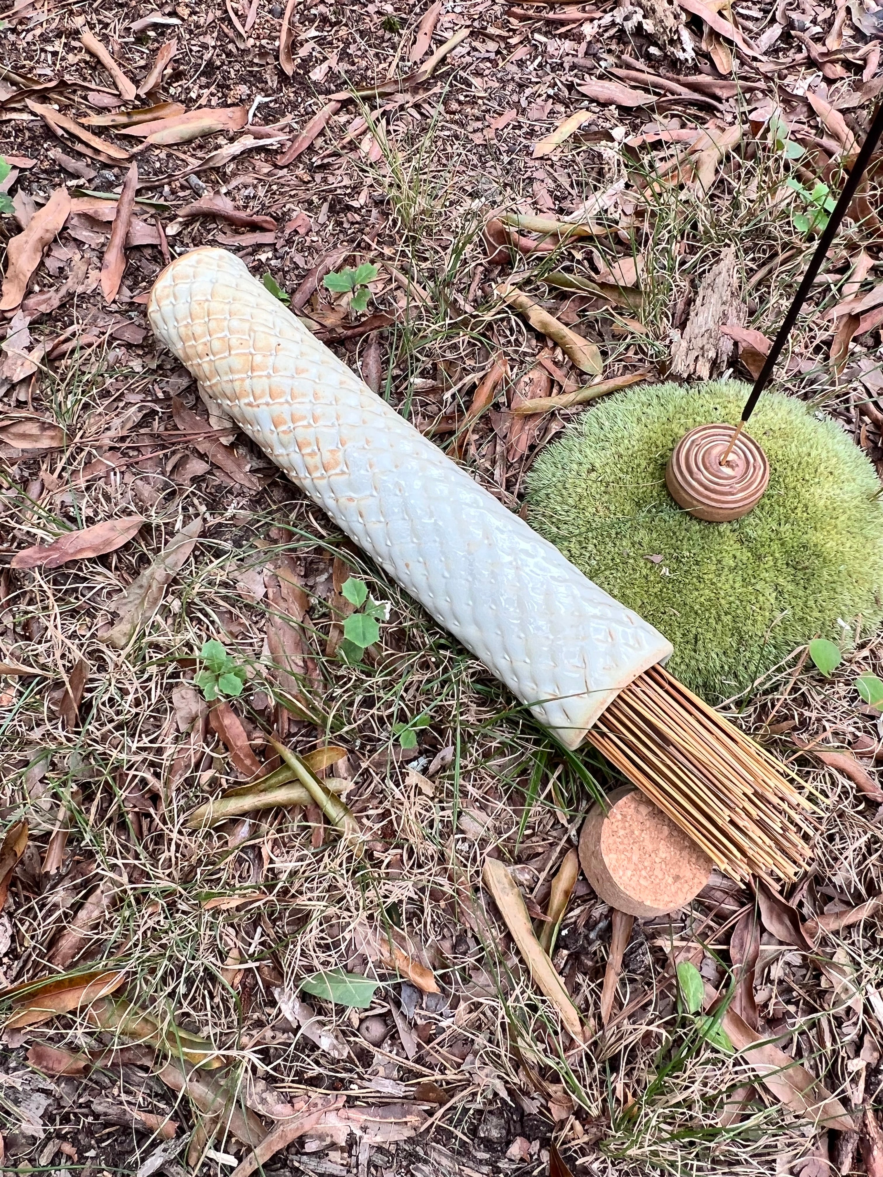 yellow scaled stick incense holder