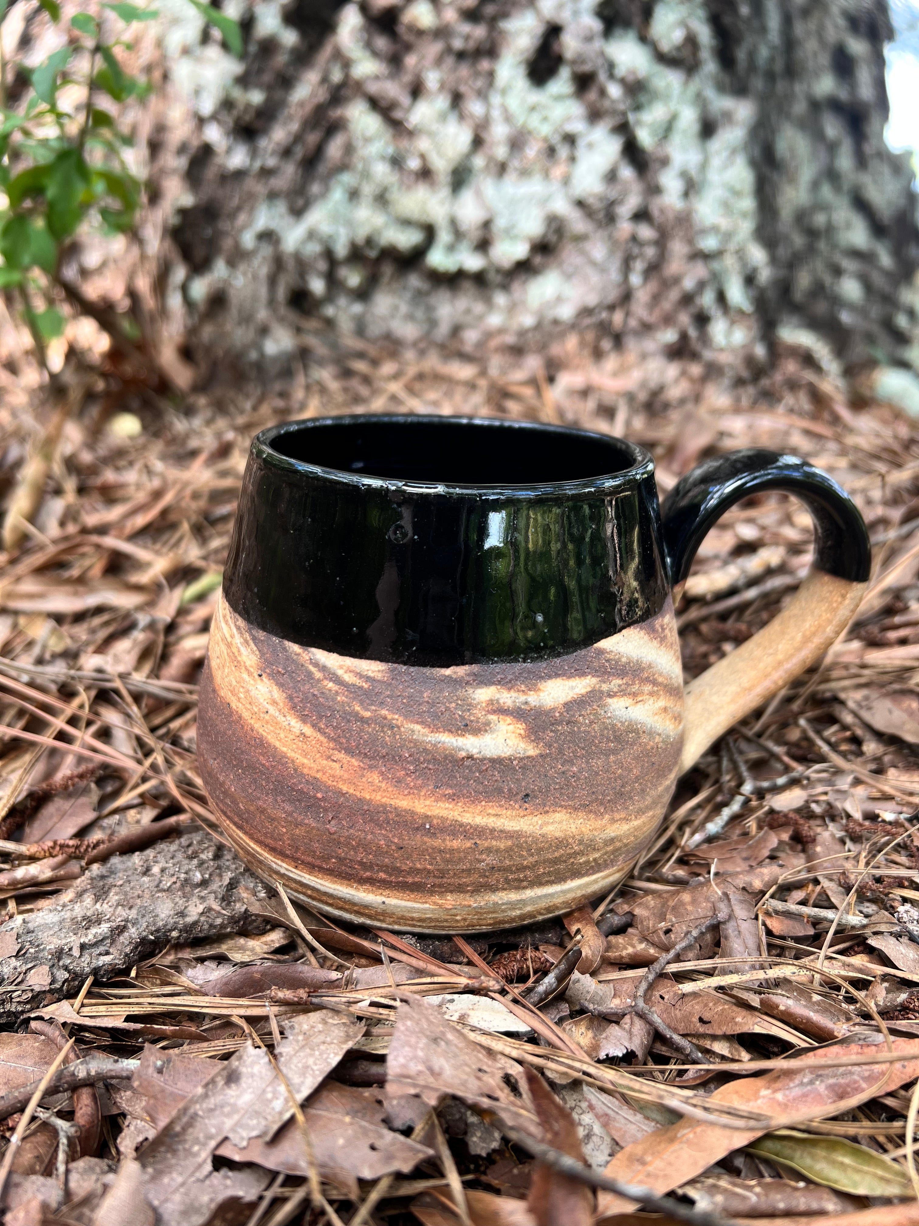 black swirled clay mug