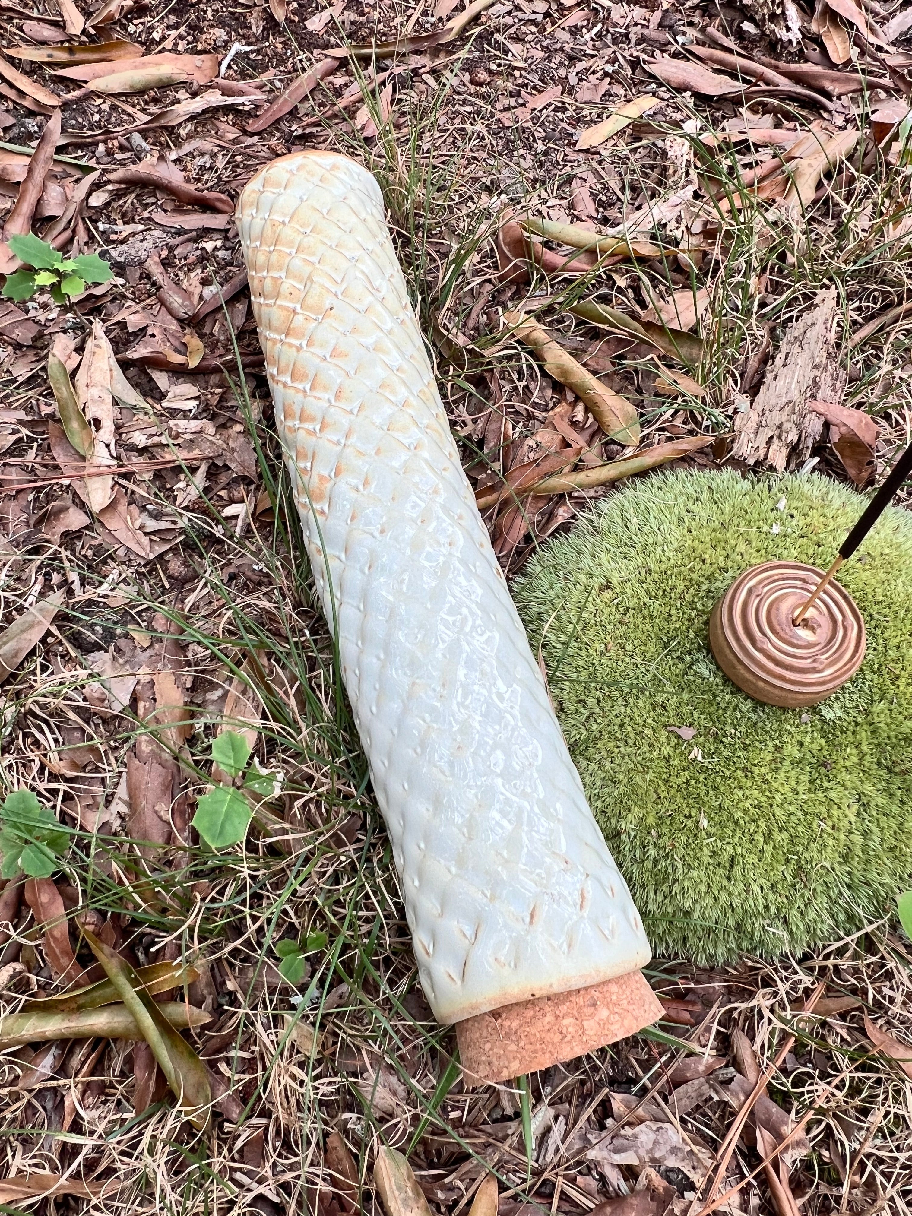 yellow scaled stick incense holder