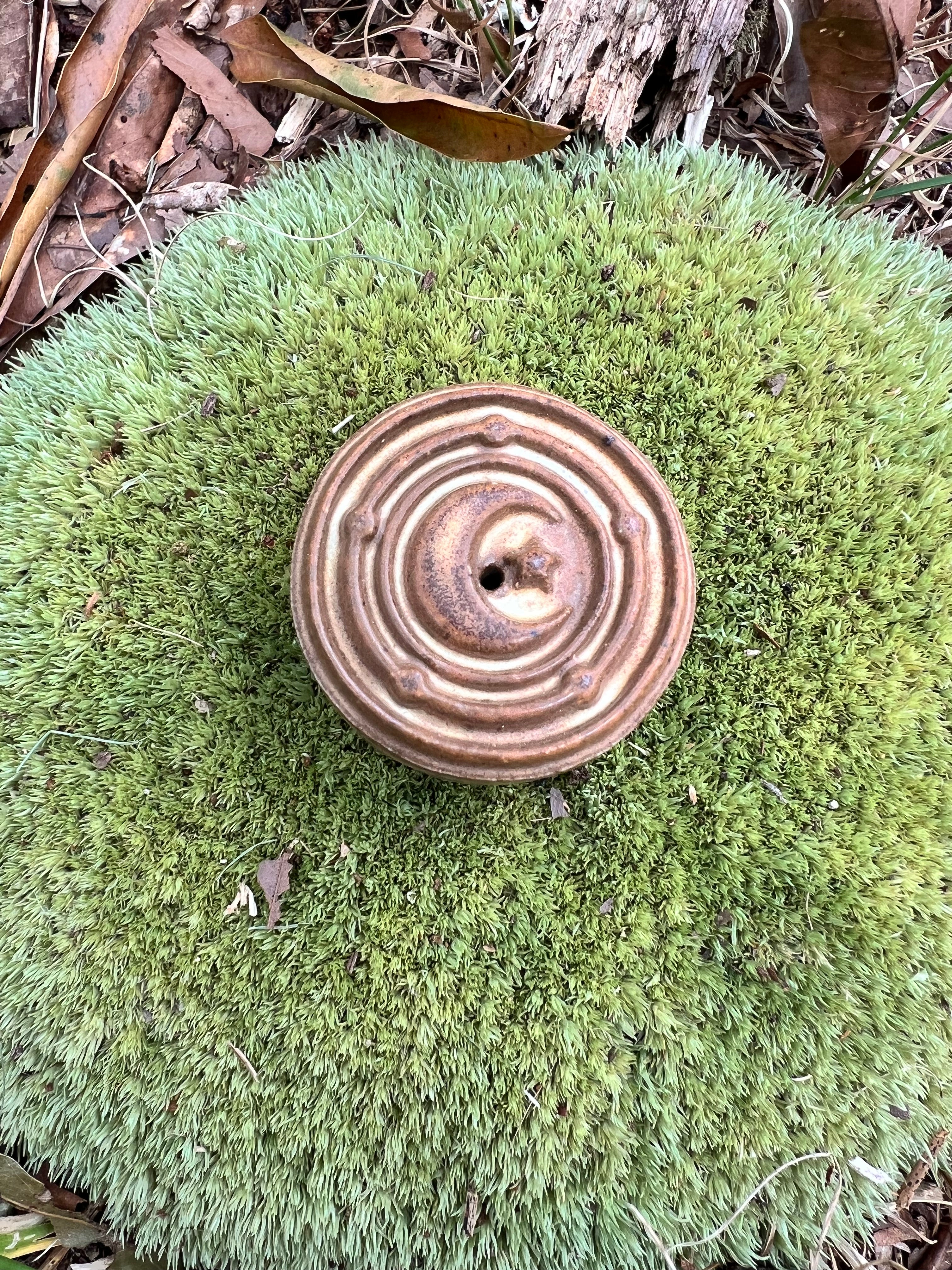 yellow incense burner