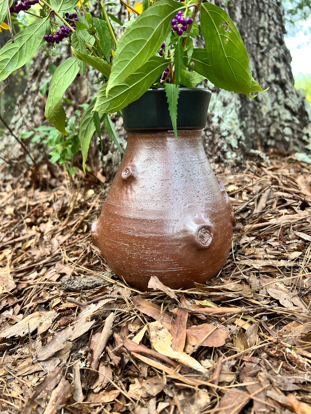 wood fired fairy door with tree knots vase