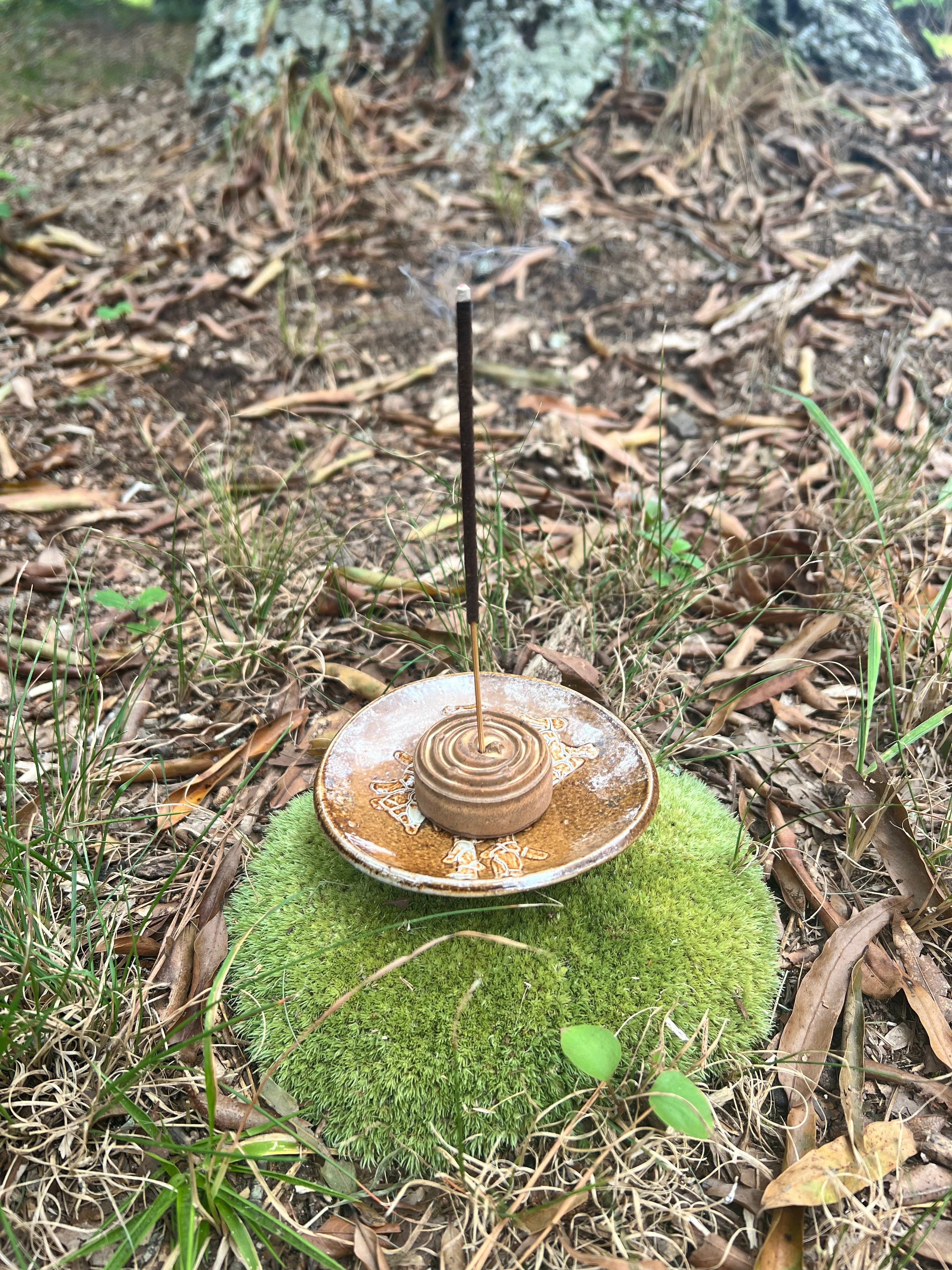 yellow incense burner