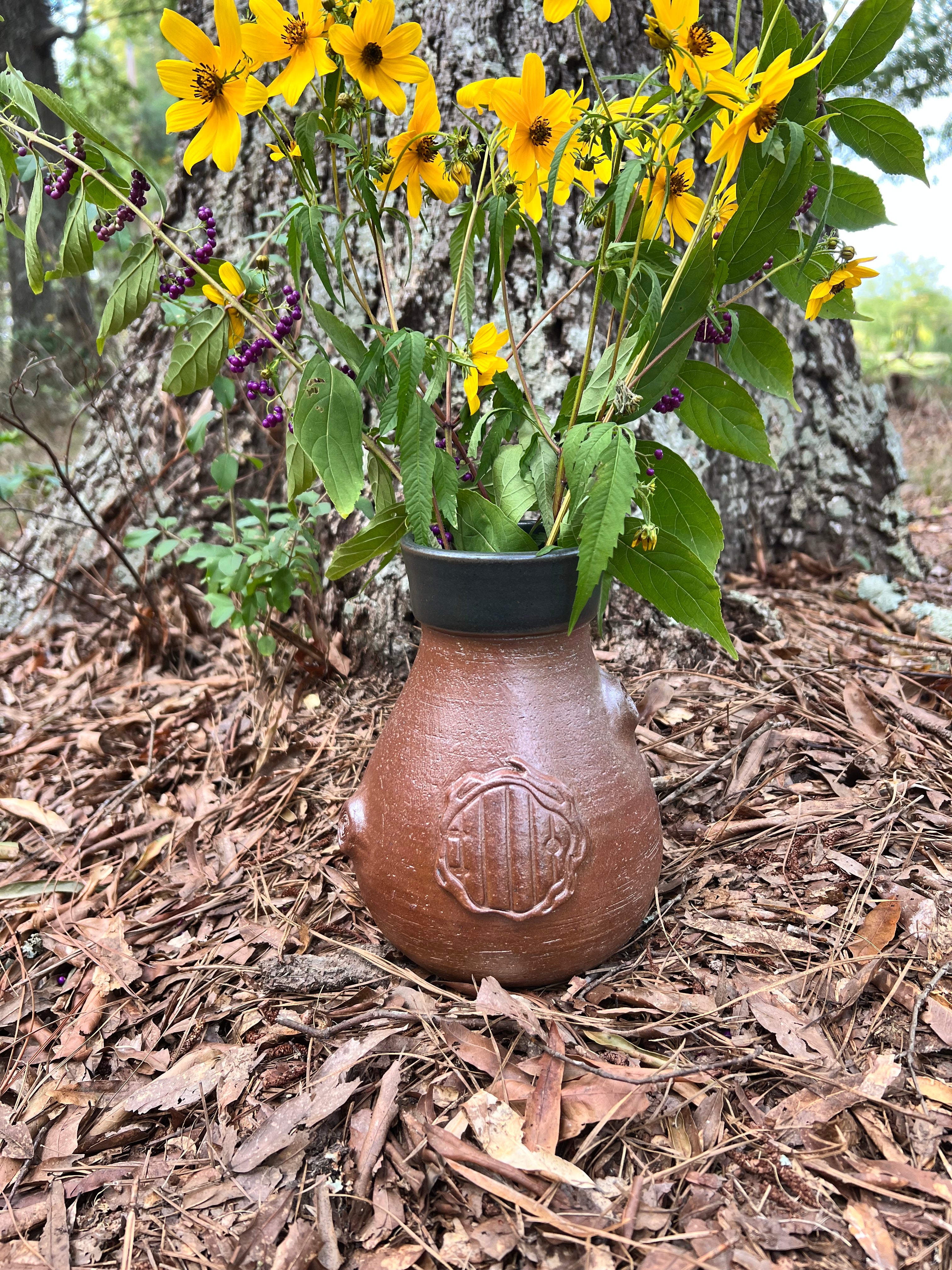 wood fired fairy door with tree knots vase