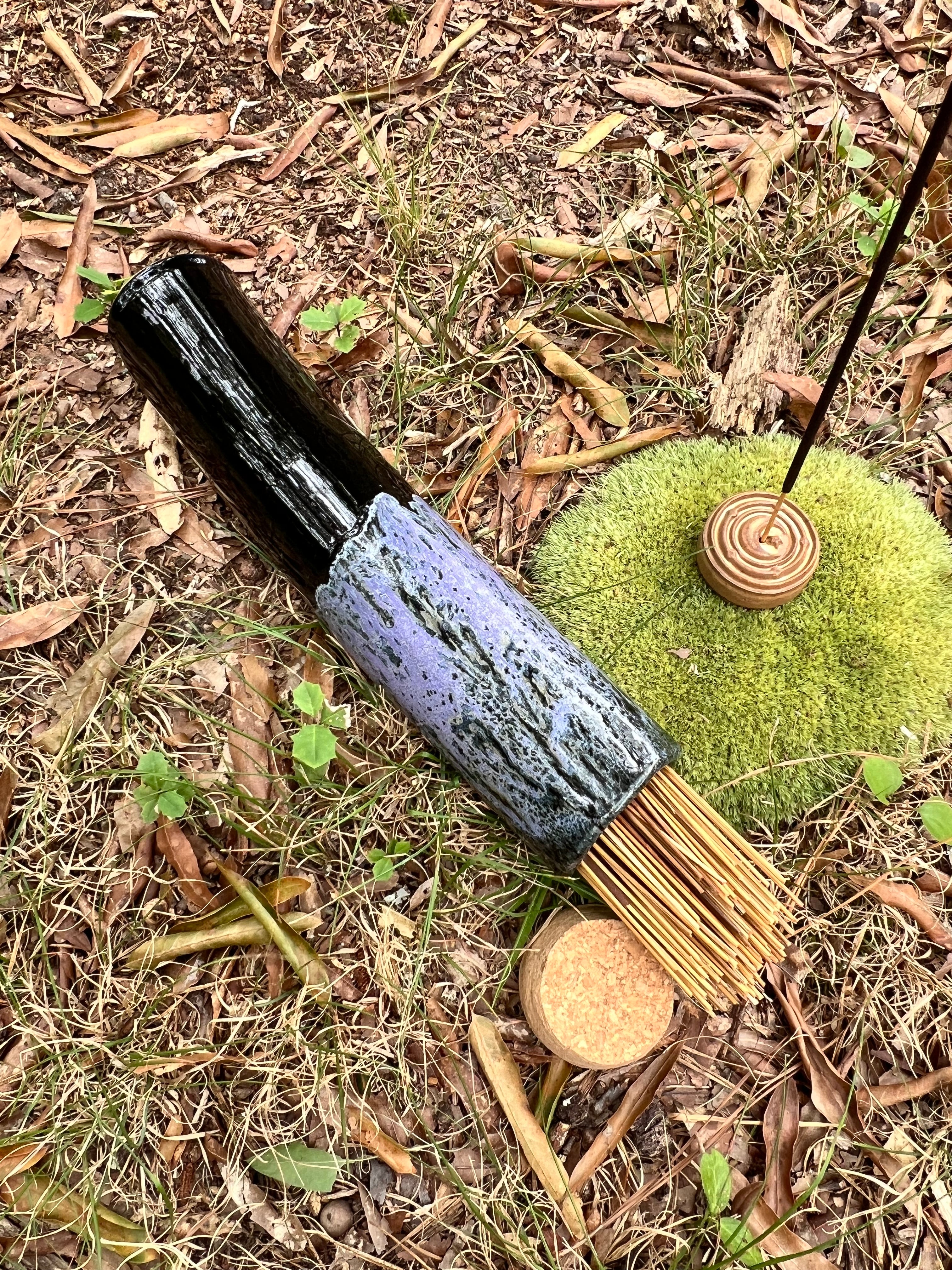black and violet stick incense holder
