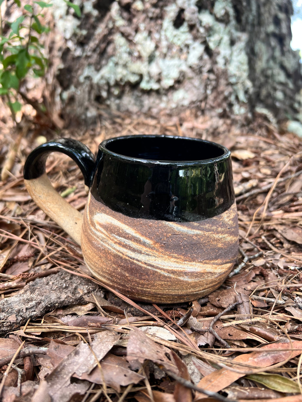 black swirled clay mug
