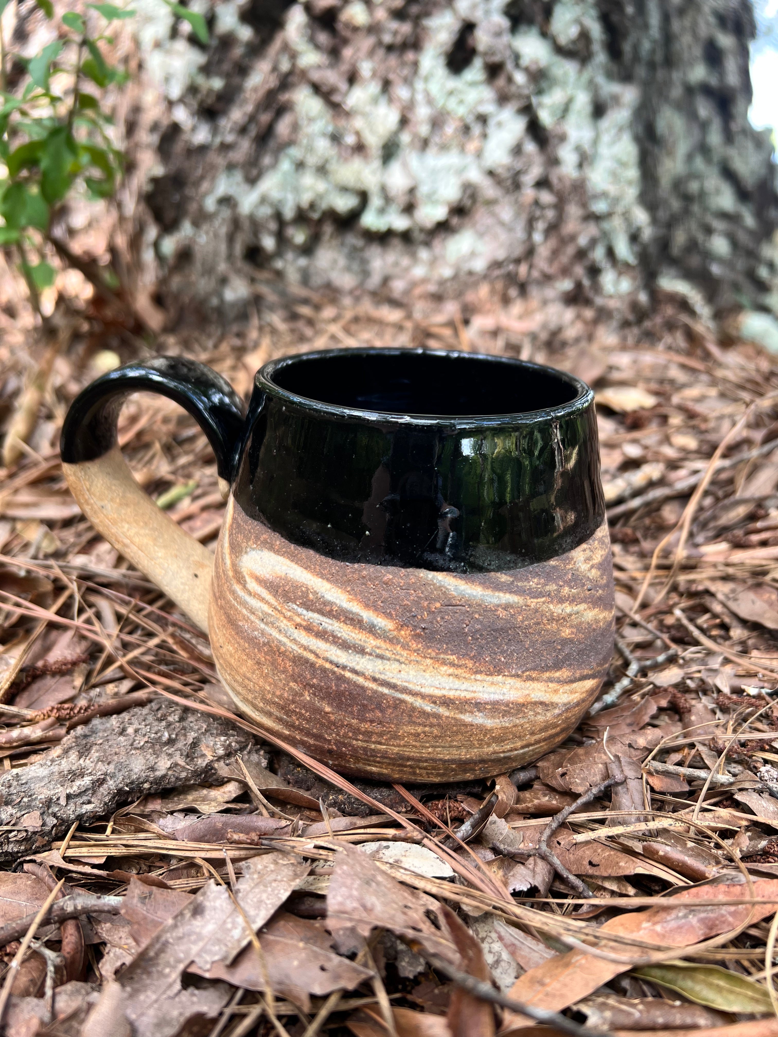 black swirled clay mug