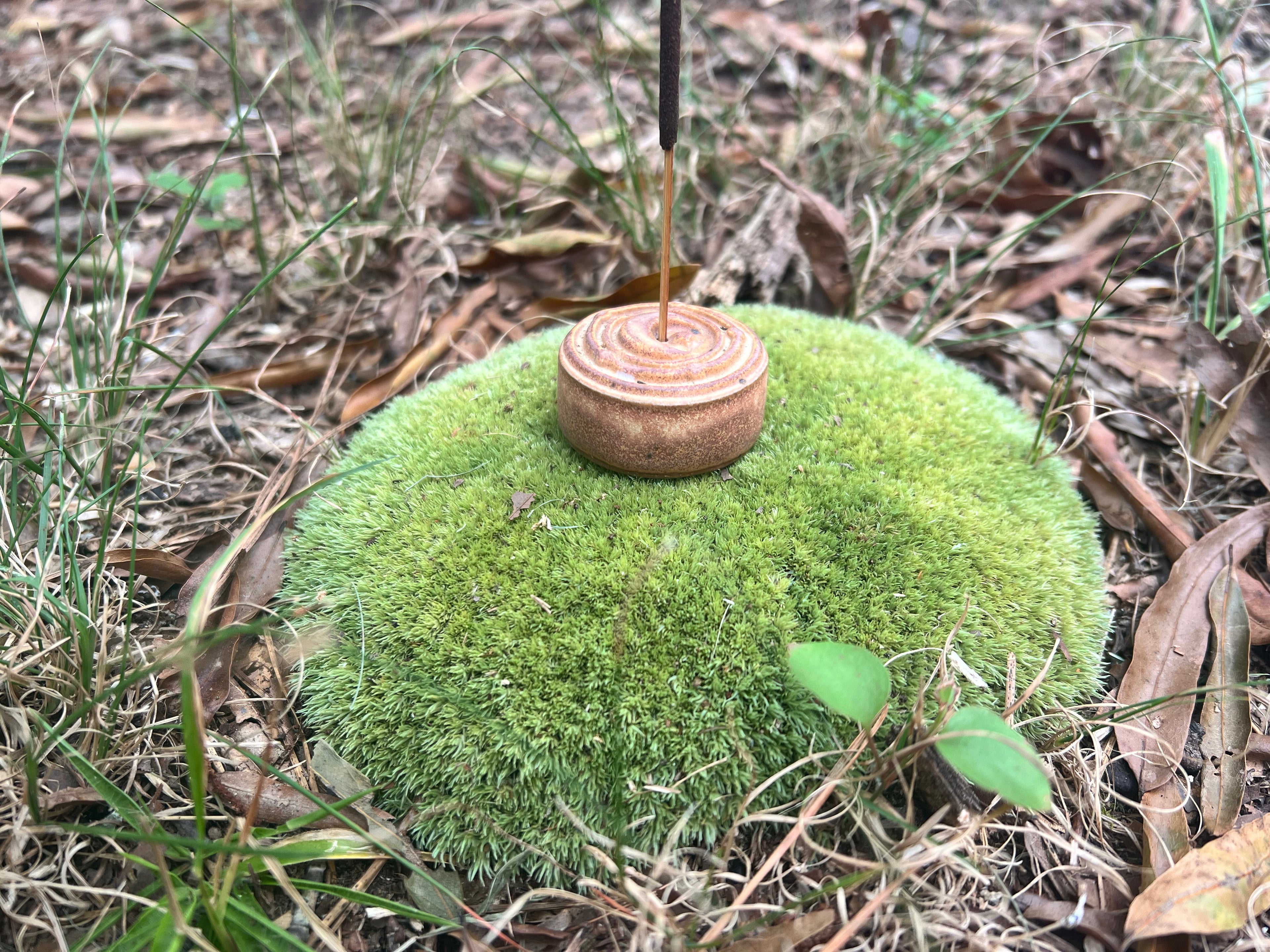yellow incense burner